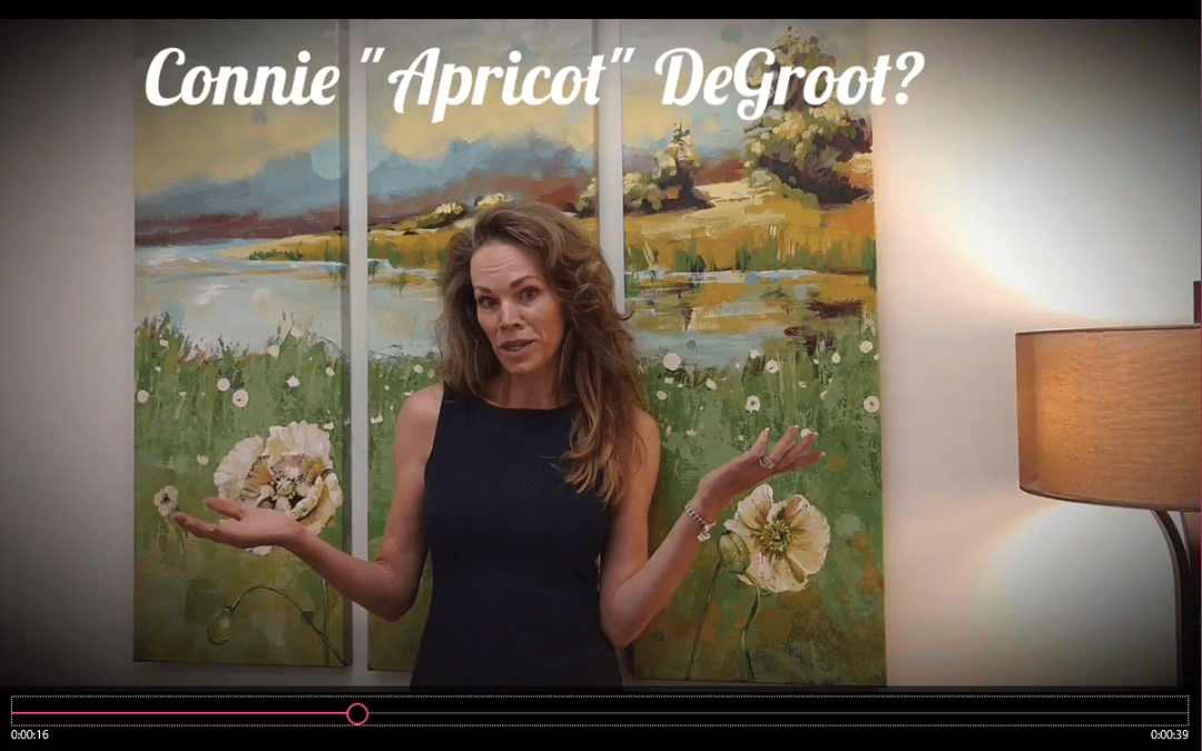 A woman is standing in front of a painting with the words connie's african degroot?.