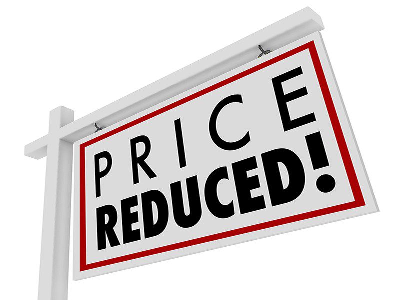 A price reduced sign on a white background.